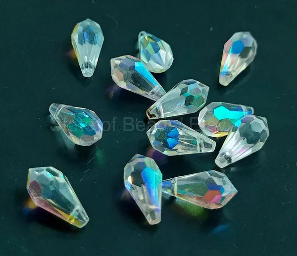 Genuine_Swarovski_Sky_Blue_Teardrop_Charm_Beads_|_6.5mm_|_4_Pcs