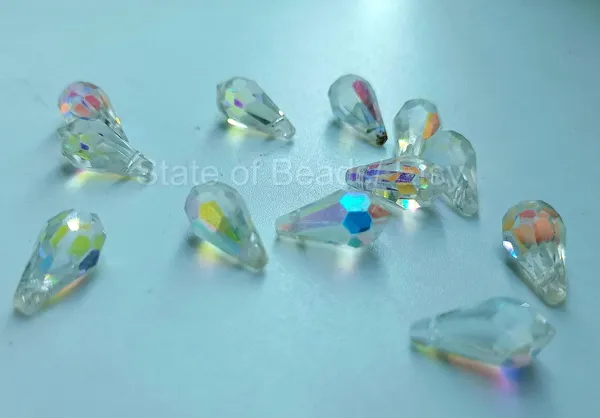 Genuine_Swarovski_Sky_Blue_Teardrop_Charm_Beads_|_6.5mm_|_4_Pcs