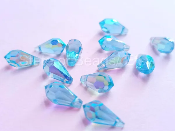 Genuine_Swarovski_Sky_Blue_Teardrop_Charm_Beads_|_5.5mm_|_4_Pcs