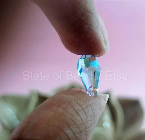 Genuine_Swarovski_Sky_Blue_Teardrop_Charm_Beads_|_5.5mm_|_4_Pcs