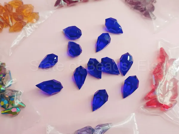 Genuine_Swarovski_Blue_Teardrop_Charm_Beads_|_5.5mm_|_4_Pcs