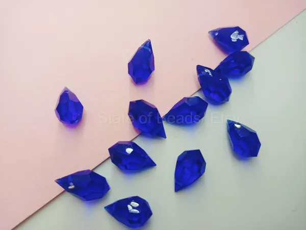 Genuine_Swarovski_Blue_Teardrop_Charm_Beads_|_5.5mm_|_4_Pcs