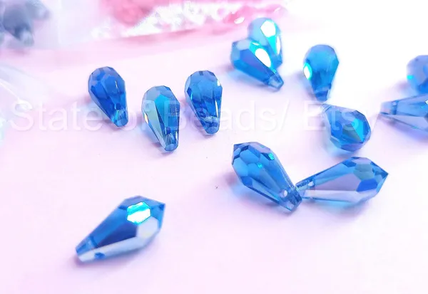 Genuine_Swarovski_Blue_Teardrop_Charm_Beads_|_4_Pcs