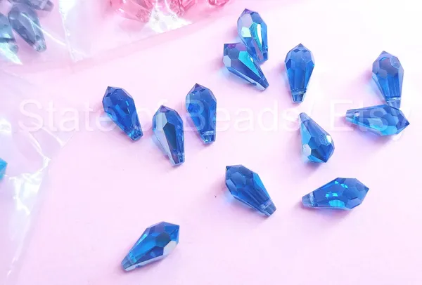 Genuine_Swarovski_Blue_Teardrop_Charm_Beads_|_4_Pcs