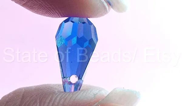Genuine_Swarovski_Blue_Teardrop_Charm_Beads_|_4_Pcs