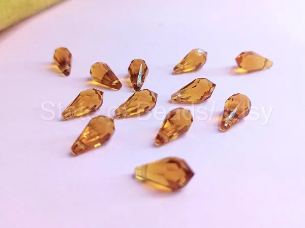 Genuine_Swarovski_Brown_Teardrop_Charm_Beads_|_5.5mm_|_4_Pcs