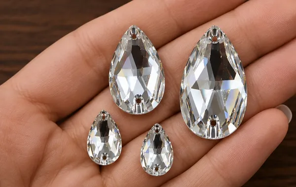 Genuine_Swarovski_White_Teardrop_Charm_Beads_|_4_Pcs_|_Size_12x7mm_and_18x10.5mm