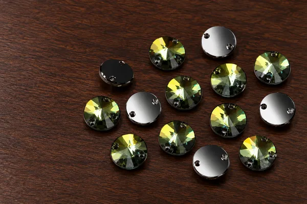 Genuine_Swarovski_Green_Rivoli_Sew-On_Crystals_|_10mm_|_2-Hole_|_Pack_of_12