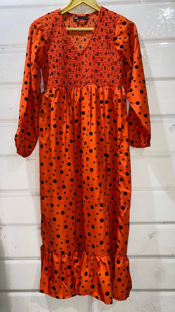 Orange_Polka_Dot_Smocked_Dress_With_Long_Sleeves