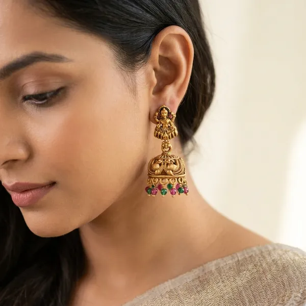 Traditional_Antique_Gold_Goddess_Jhumka_Earrings_with_Red_Bead_Drops