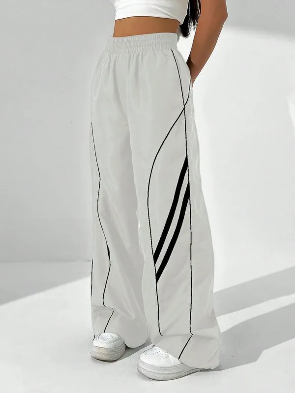 Womens_White_Track_Pants_With_Black_Curved_Stripe_Design