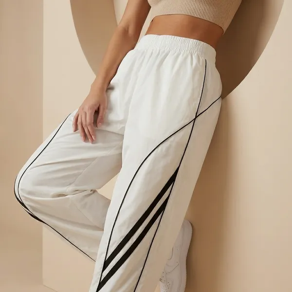 Womens_White_Track_Pants_With_Black_Curved_Stripe_Design