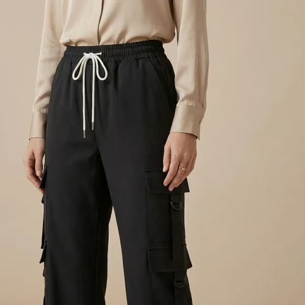 Womens_Black_Cargo_Pants_With_Multiple_Pockets_And_Drawstring_Waist