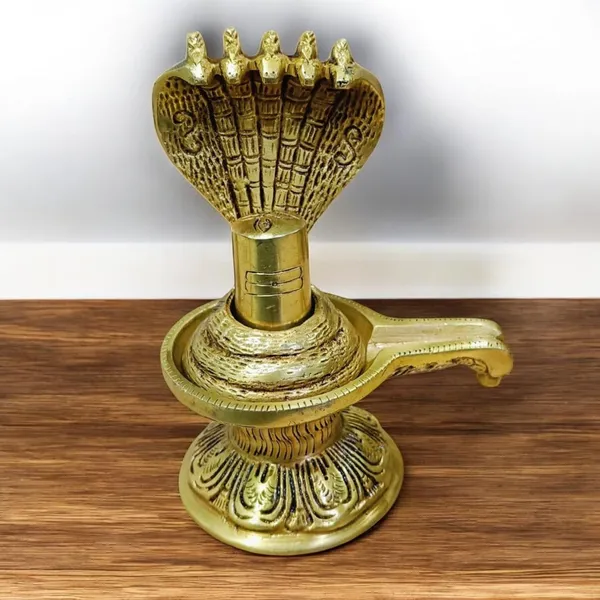 Sjl_Brass_Shivling_Religious_Idol_The_Symbol_For_The_Creation_Of_The_Universe_Decorative_Showpiece_16_Cm_Brass_Gold