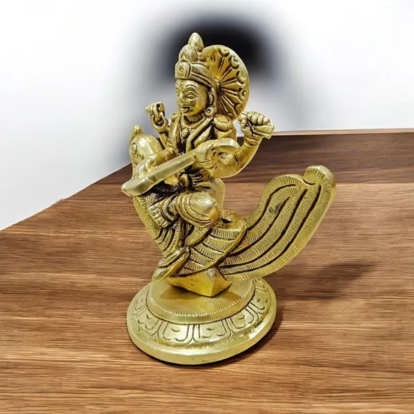 Goddess_Saraswati_Sitting_On_A_Peacock_For_Desk_And_Home_Decor_Antique_Finish_Decorative_Showpiece_11_Cm_Brass_Gold