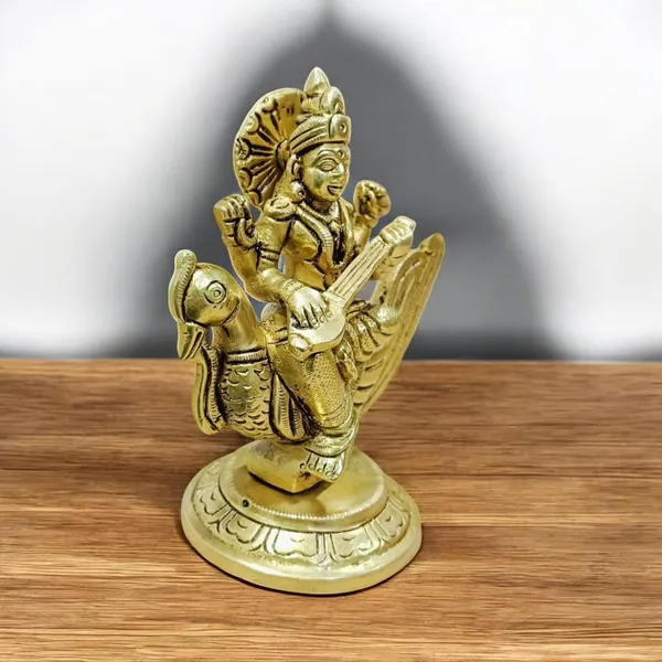 Goddess_Saraswati_Sitting_On_A_Peacock_For_Desk_And_Home_Decor_Antique_Finish_Decorative_Showpiece_11_Cm_Brass_Gold
