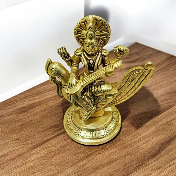 Goddess_Saraswati_Sitting_On_A_Peacock_For_Desk_And_Home_Decor_Antique_Finish_Decorative_Showpiece_11_Cm_Brass_Gold