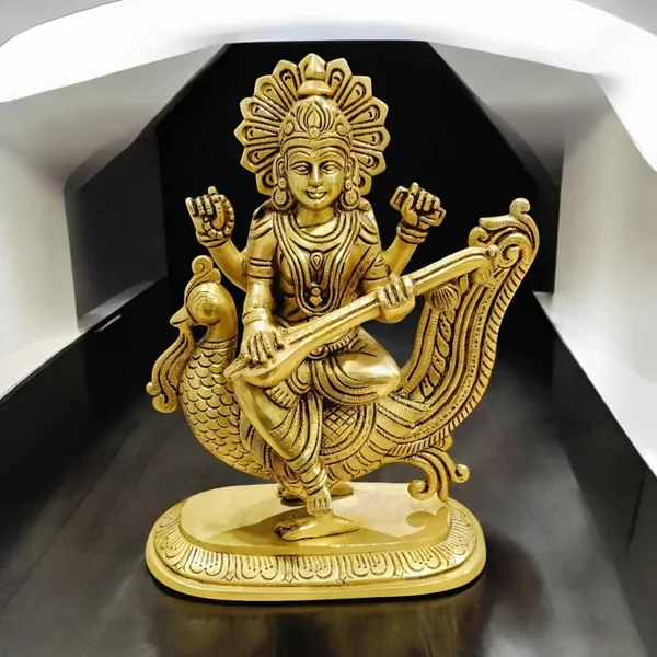 Goddess_Saraswati_Sitting_On_A_Peacock_For_Desk_And_Home_Decor_Antique_Finish_Decorative_Showpiece_18_Cm_Brass_Gold