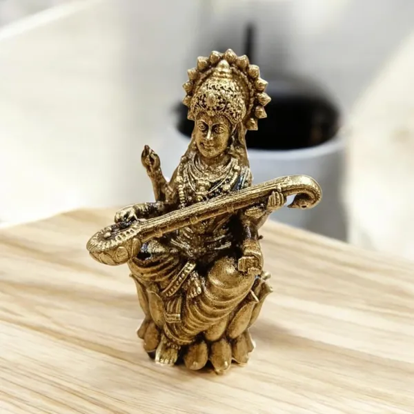 Sjl_Wax_Casting_Brass_Goddess_Saraswati_Idol_Sitting_On_A_Flower_Antique_Finish_Statue_With_Veena_For_Home_Temple_Study_Table_Gift_Purpose_Desk_Decor_Decorative_Showpiece_5_Cm_Brass_Gold