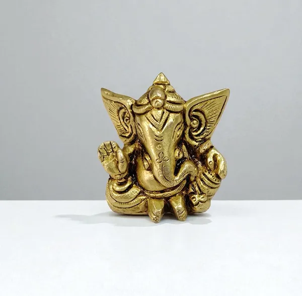 Sjl_Exports_Brass_Ganesha_Sitting_Idol_For_Home_Temple_Puja_Mini_Brass_Ganesha_Idol_Sitting_Position_7_Cm_Puja_Statue
