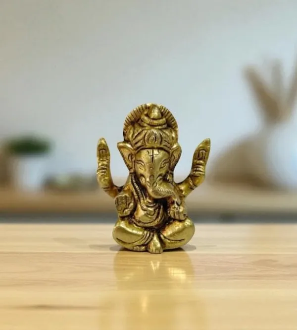 Sjl_Exports_Brass_Lord_Ganesha_Idol_Sitting_Position_With_4_Hands_For_Puja_Handcrafted_Brass_Ganesha_Statue_Sitting_Ganpati_Murti_With_Four_Arms_5_Cm