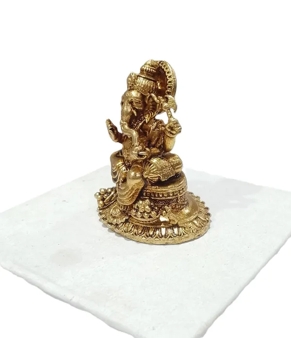 Sjl_Exports_Wax_Casting_Brass_Ganesha_Idol_Sitting_On_Sofa_4.5_Cm_Height_Gold_Finish_Religious_Decor_Traditional_Brass_Ganpati_Statue_Sitting_Pose_Idol_For_Devotion_Decor