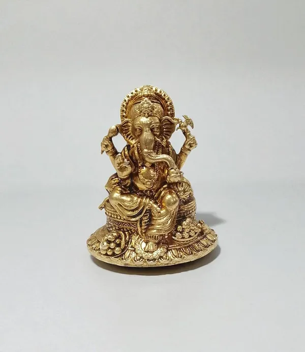 Sjl_Exports_Wax_Casting_Brass_Ganesha_Idol_Sitting_On_Sofa_4.5_Cm_Height_Gold_Finish_Religious_Decor_Traditional_Brass_Ganpati_Statue_Sitting_Pose_Idol_For_Devotion_Decor
