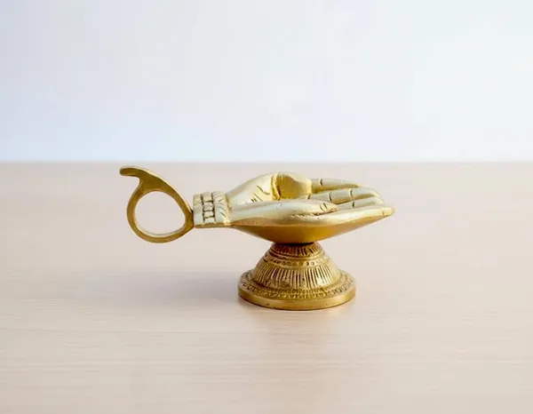 Traditional_Brass_Namaste_Hand_Diya_Decorative_Oil_Lamp_With_Handle_11_Cm_Length_5_5_Cm_Height_Golden_Temple_Pooja_Lamp_For_Home_Aarti_Festivals_Handcrafted_Religious_Artifact