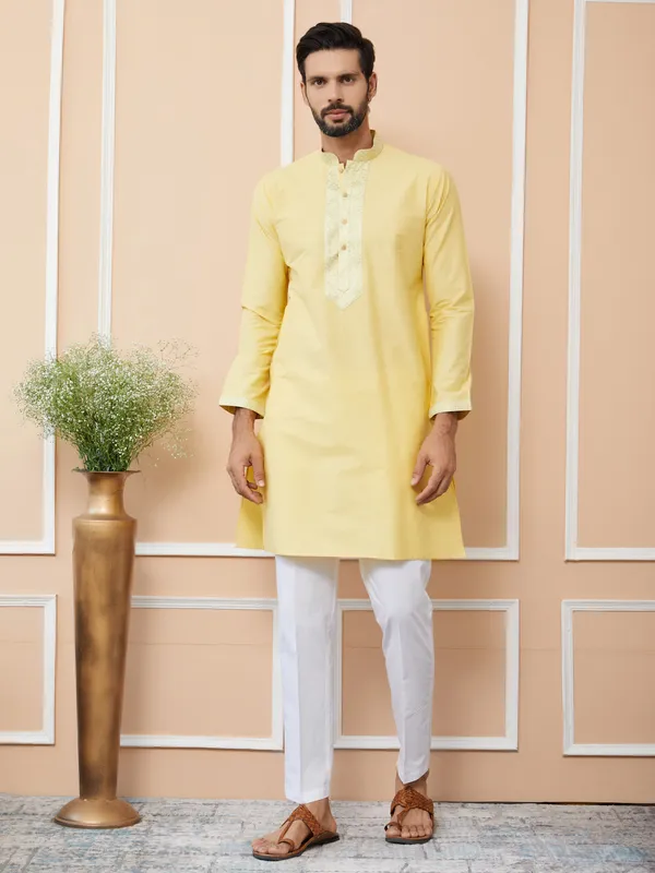 Yellow_Solid_Cotton_Straight_Kurta_With_Pyjama_With_Jacquard_Neckline