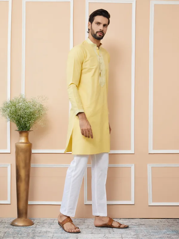 Yellow_Solid_Cotton_Straight_Kurta_With_Pyjama_With_Jacquard_Neckline