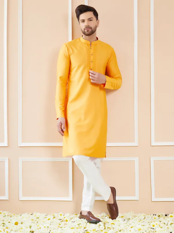 Mustard_Raw_Silk_Straight_Kurta_With_Pintuck_Neckline_And_Pyjama