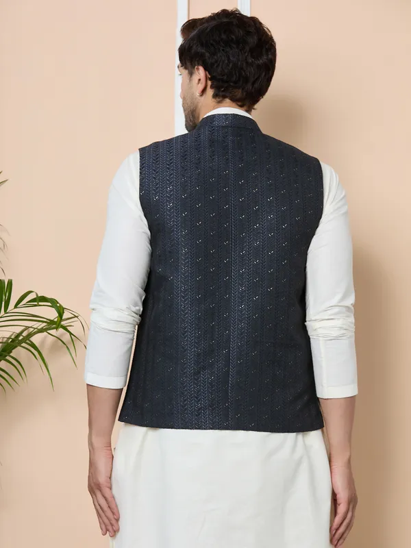 Black_Woven_Jacquard_Nehru_Jacket_With_Solid_Kurta-Pyjama_(3_Piece_Set)