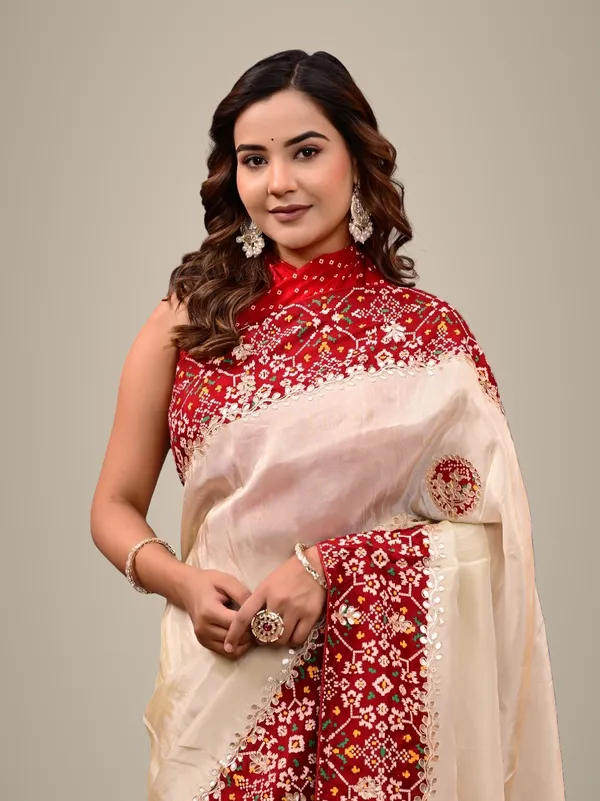 Patola_Silk_Saree_With_Cosmo_Tissue_Border_Bandhani_Patching_Gota_Patti_Work_Red