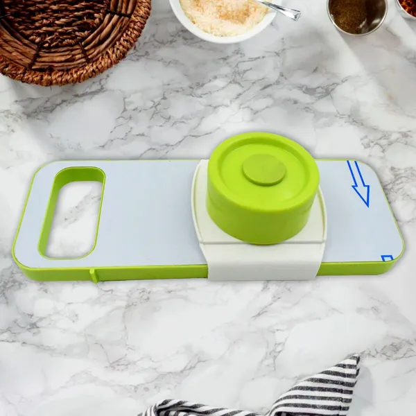 Multi-Functional_Vegetable_Slicer_and_Grater_with_Container_-_3-in-1_Kitchen_Tool_Set_(Green_&_White)
