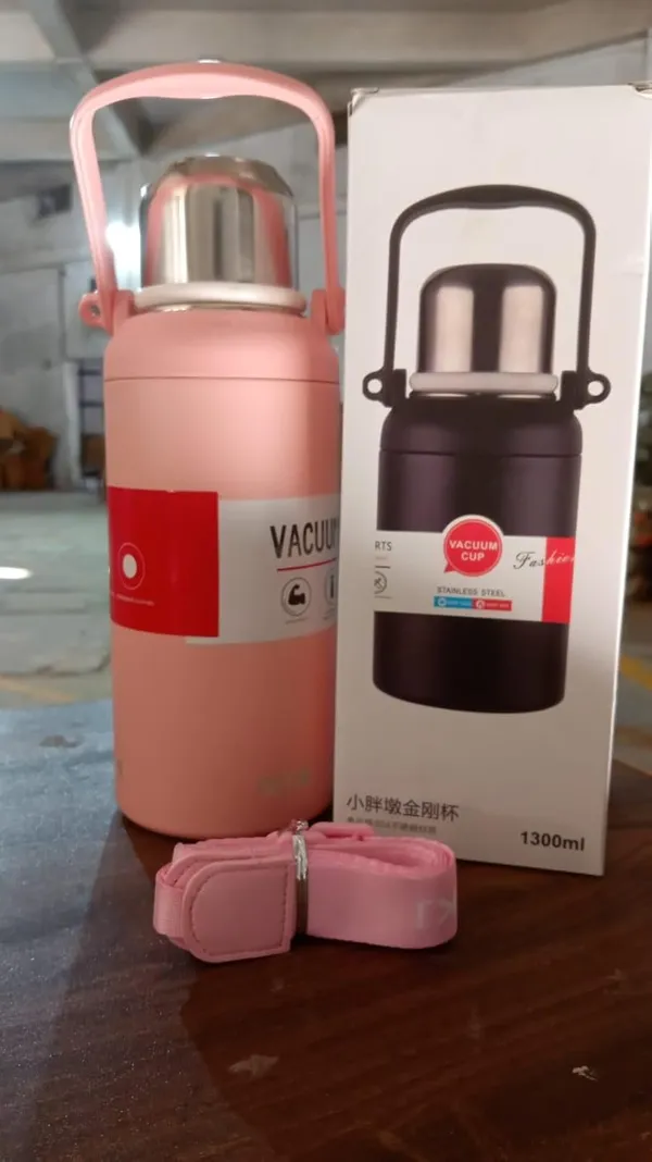 Stainless_Steel_Vacuum_Insulated_Water_Bottle_with_Shoulder_Strap_-_1300ml_(Pink)