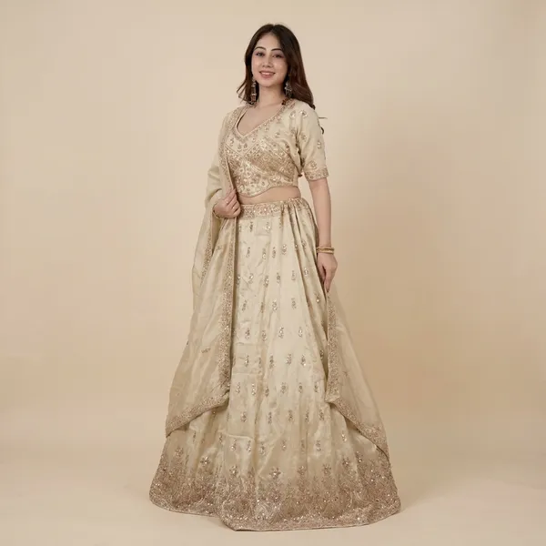 Beige_And_Gold_Heavy_Silk_Embroidered_Stitched_Lehenga_Choli_Set_For_Women