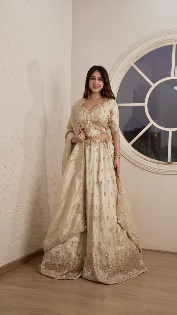 Beige_And_Gold_Heavy_Silk_Embroidered_Stitched_Lehenga_Choli_Set_For_Women