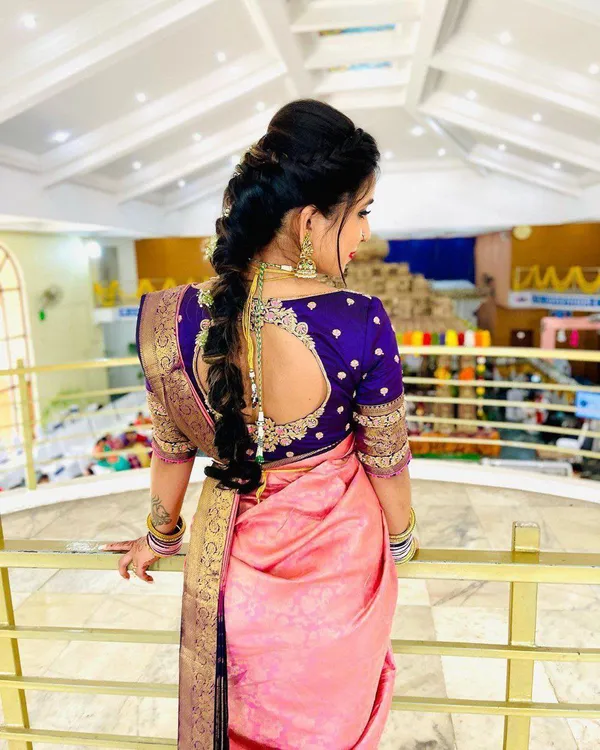 Pink_And_Purple_Banarasi_Silk_Saree_With_Gold_Zari_Border_And_Contrast_Blue_Blouse