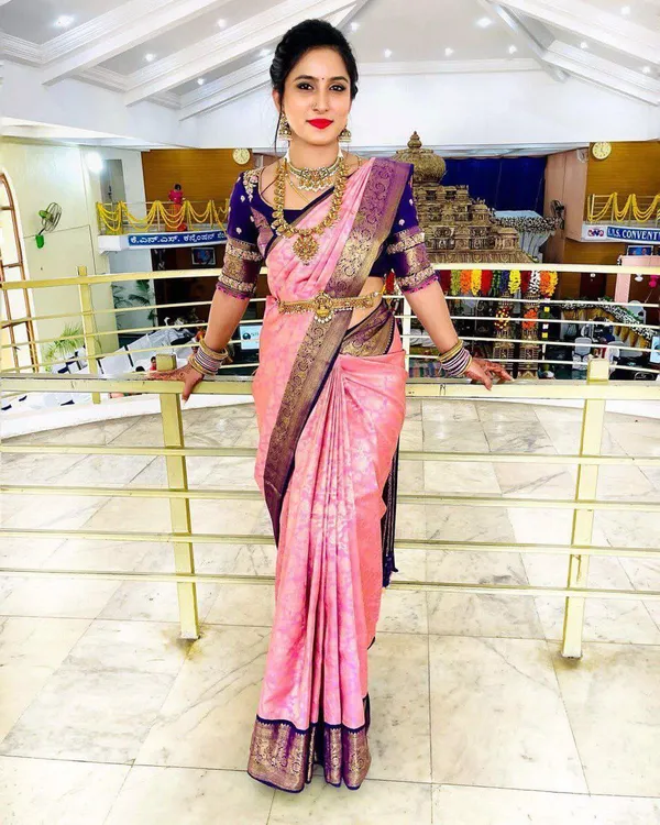 Pink_And_Purple_Banarasi_Silk_Saree_With_Gold_Zari_Border_And_Contrast_Blue_Blouse