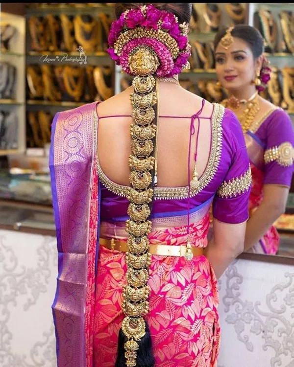 Pink_And_Purple_Kanjivaram_Silk_Bridal_Saree_With_Heavy_Gold_Zari_Work