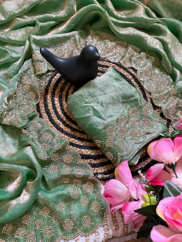 Green_Organza_Festive_Saree_With_Heavy_Gold_Zari_Embellishments