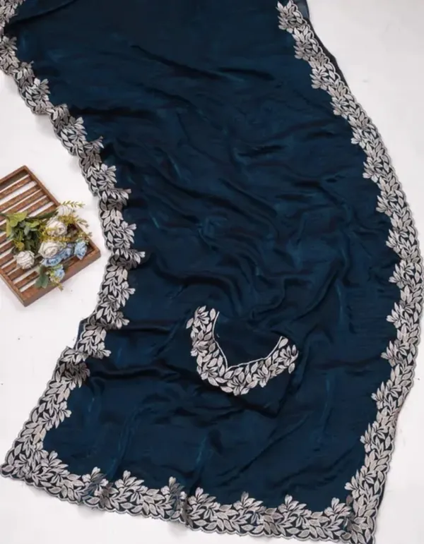 Teal_Blue_Georgette_Party_Wear_Saree_With_Embroidered_Border_And_Blouse