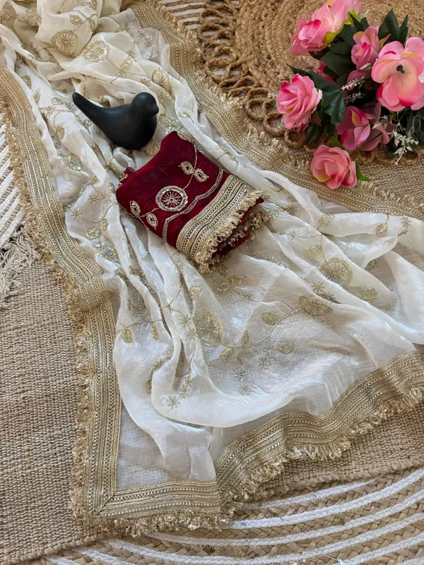 White_Embroidered_Saree_With_Gold_Border_And_Contrast_Maroon_Blouse
