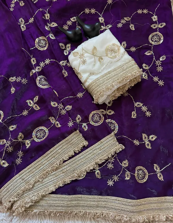 Blue_Embroidered_Saree_With_Gold_Border_And_Contrast_White_Blouse