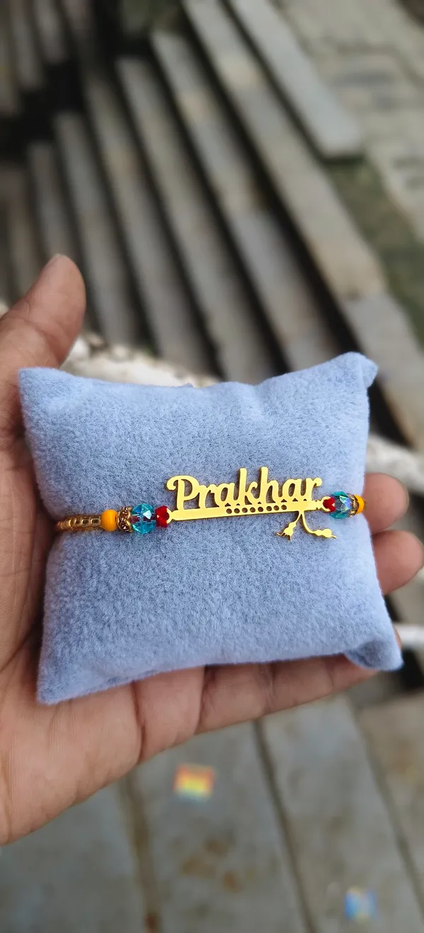 Personalized_Name_Rakhi_with_Designer_Crystal_Beads_-_Custom_Gold_Plated_Name_Bracelet_for_Brother_-_Premium_Rakshabandhan_Gift