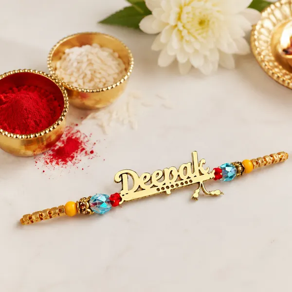 Personalized_Name_Rakhi_with_Designer_Crystal_Beads_-_Custom_Gold_Plated_Name_Bracelet_for_Brother_-_Premium_Rakshabandhan_Gift
