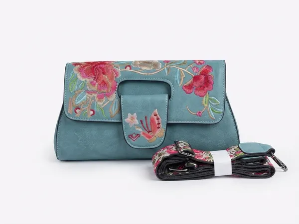 Premium_Ice_Blue_Faux_Leather_Handbag_with_Vibrant_Rose_Embroidery_and_Magnetic_Flap