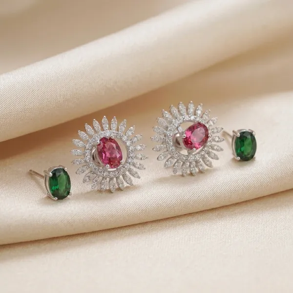 Elegant_Sun_Inspired_Stud_Earrings_With_Red_And_Green_Stones