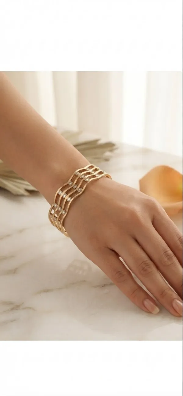 Gold-Tone_Bracelet_with_AD