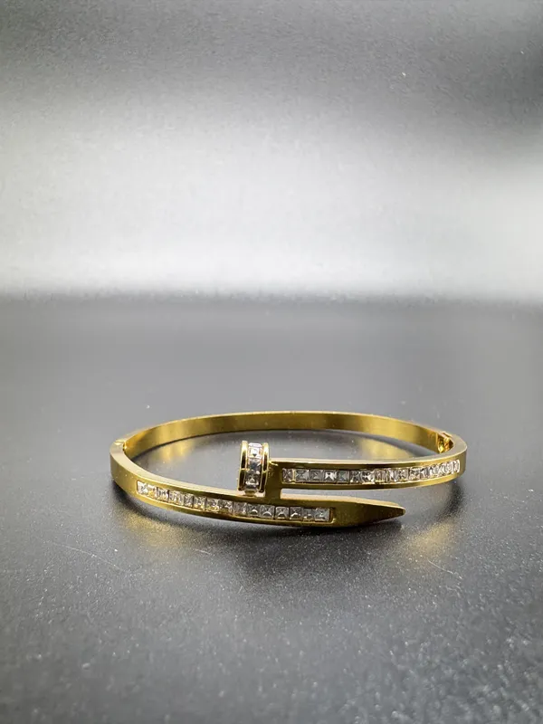 Gold-Plated_Nail_Bangle_Bracelet_With_Princess-Cut_Cubic_Zirconia